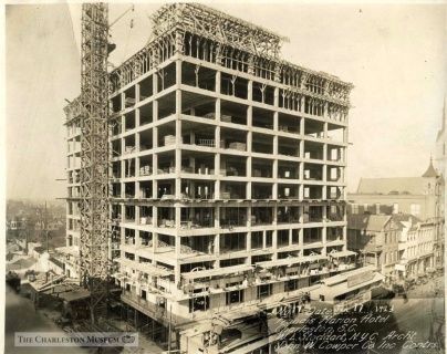 The construction of the hotel shows scaffolding to the left hand side.