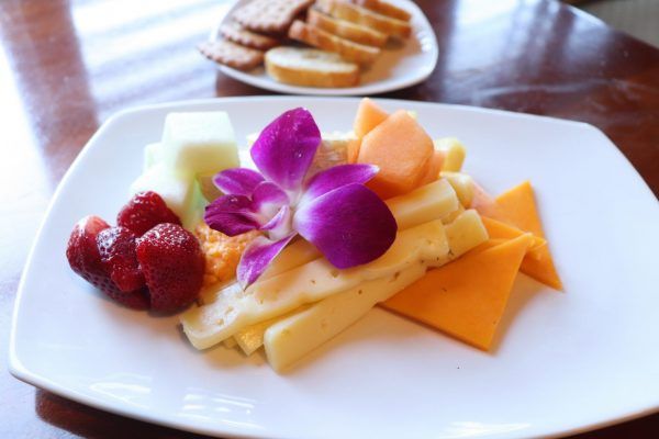 A plate of a variety of cheeses.