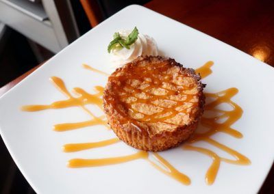 A plate with a Carmel cakes.