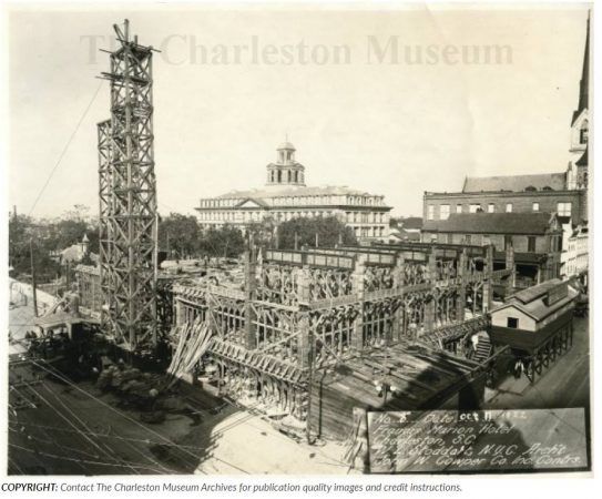 The construction of the hotel shows scaffolding to the left hand side and the first few levels are being built and show the beams.