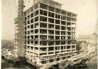 The construction of the hotel shows scaffolding to the left hand side.