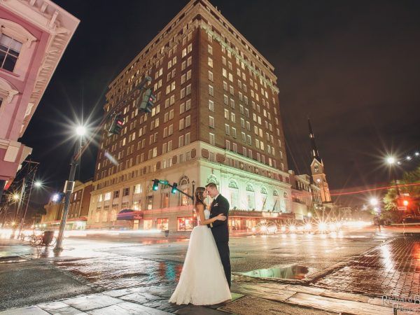 wedding photo in front of hotel